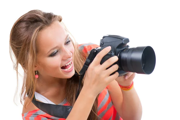 Menina adolescente com câmera fotográfica profissional. Isolado em branco — Fotografia de Stock