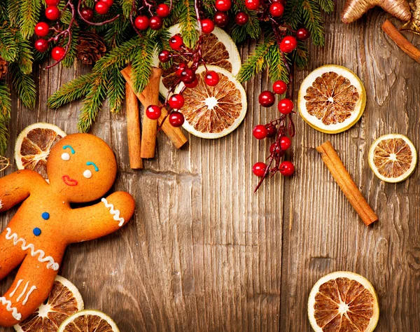 Kerst vakantie achtergrond. Gingerbread man — Stockfoto
