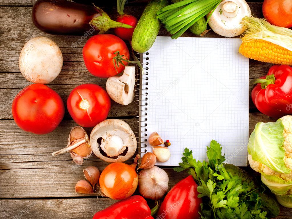 Open Notebook and Fresh Vegetables Background. Diet