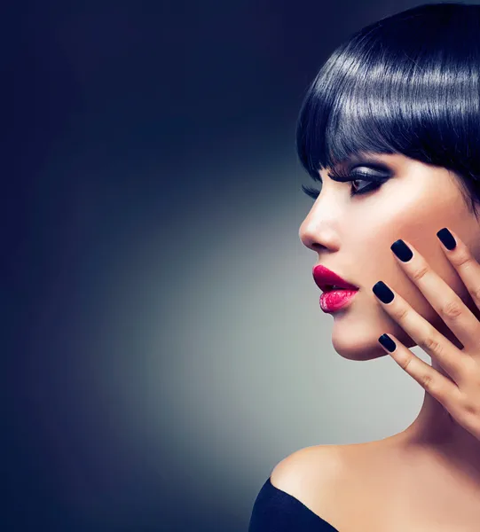 Beautiful Brunette Girl Portrait. Face. Makeup. Sensual Red Lips Stock Photo