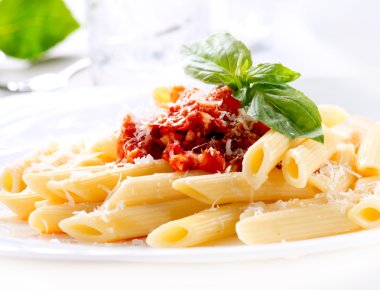 Pasta Penne with Bolognese Sauce, Basil and Parmesan