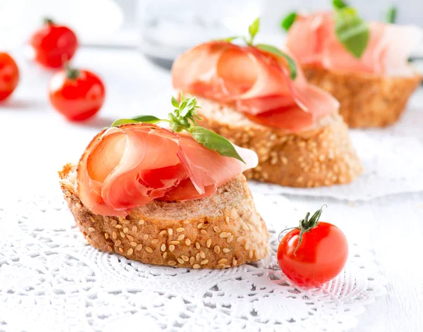 Jamon. Slices of Bread with Spanish Serrano Ham. Prosciutto — Stock Photo, Image