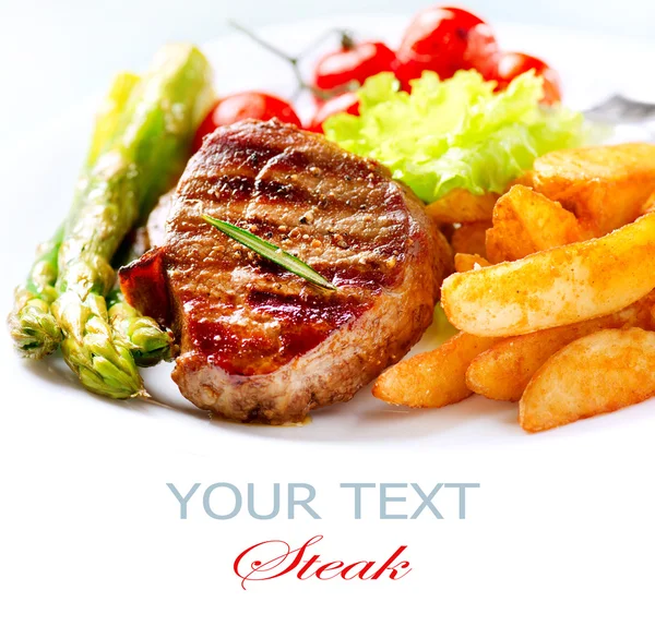 Grilled Beef Steak Meat with Fried Potato, Asparagus, Tomatoes