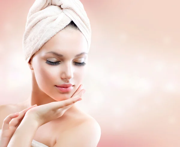 Beautiful Girl After Bath Touching Her Face. Skincare Stock Photo