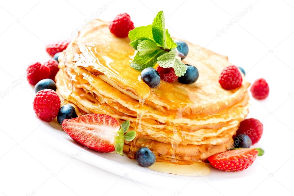 Pancake. Crepes With Berries. Pancakes stack isolated on White