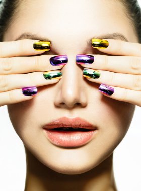 Manicure and Make-up. Nail art. Beauty Woman With Colorful Nails clipart