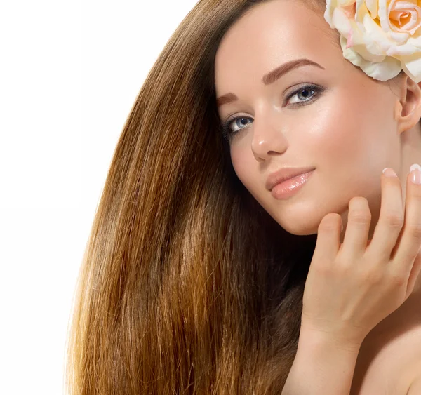 Beauty Girl. Beautiful Model with Rose Flower Touching her Face — Stock Photo, Image