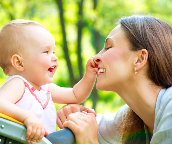 Beautiful Mother And Baby outdoors. Nature — Stock Photo, Image