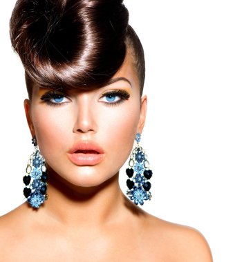 Fashion Model Girl Portrait with Blue Eyes. Creative Hairstyle