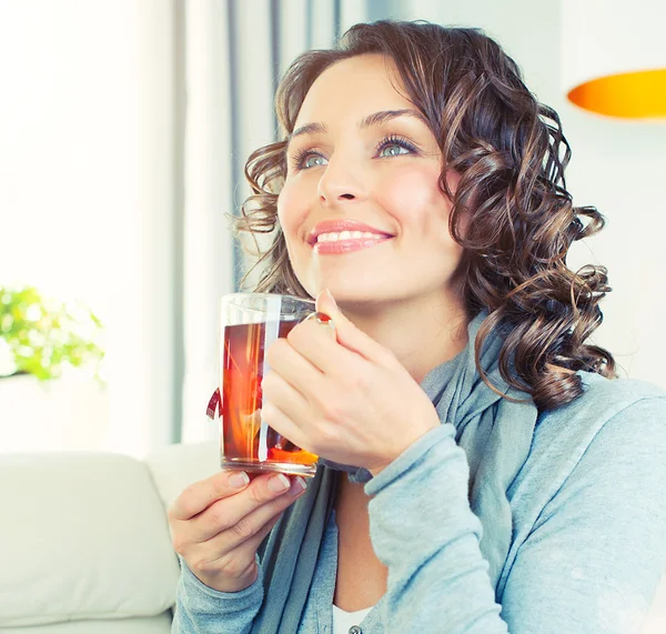 Beautiful Girl Enjoying Coffee. Woman with Cup of Hot Beverage Stock Photo