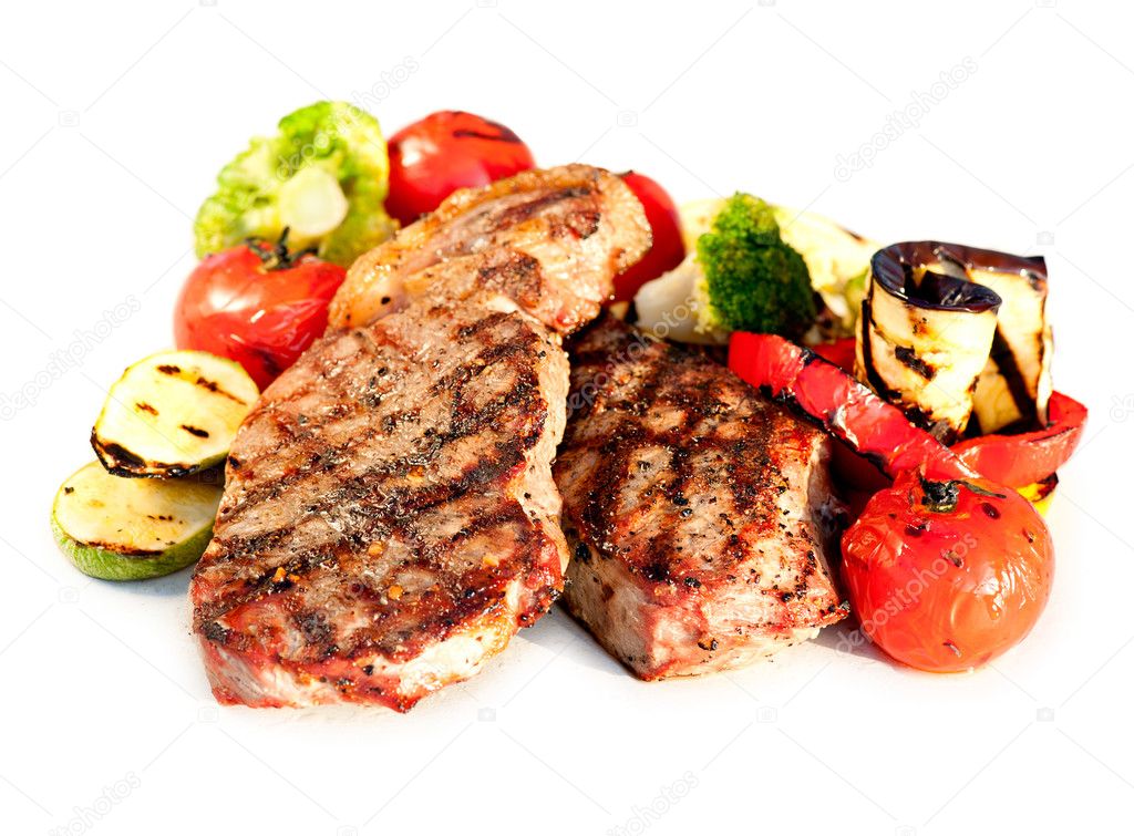 Grilled Beef Steak with Vegetables over White Background