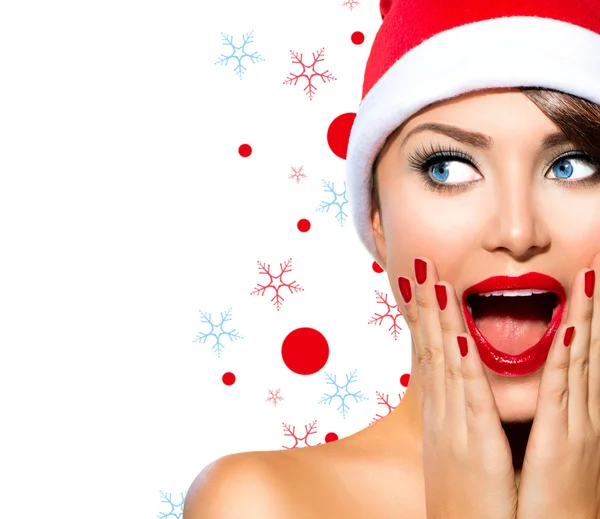 Donna di Natale. Modello di bellezza ragazza in Santa Hat — Foto Stock