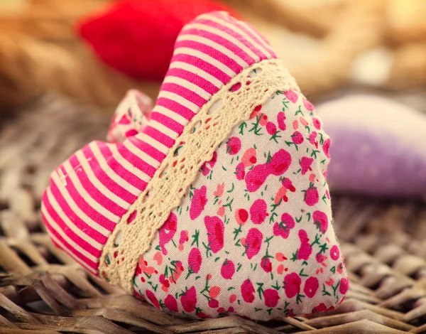 Valentine's Day. Handmade fabric heart over wood background — Stock Photo, Image