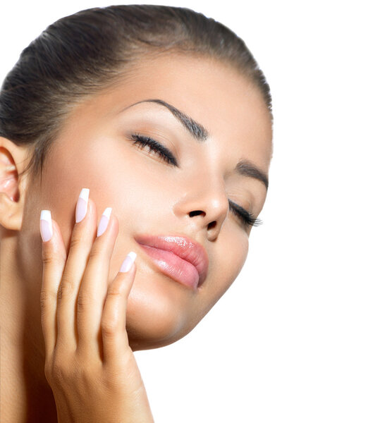 Beauty Spa Woman Portrait. Beautiful Girl Touching her Face