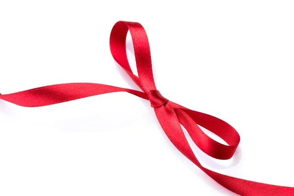 Red satin gift bow. Red silk ribbon — Stock Photo, Image