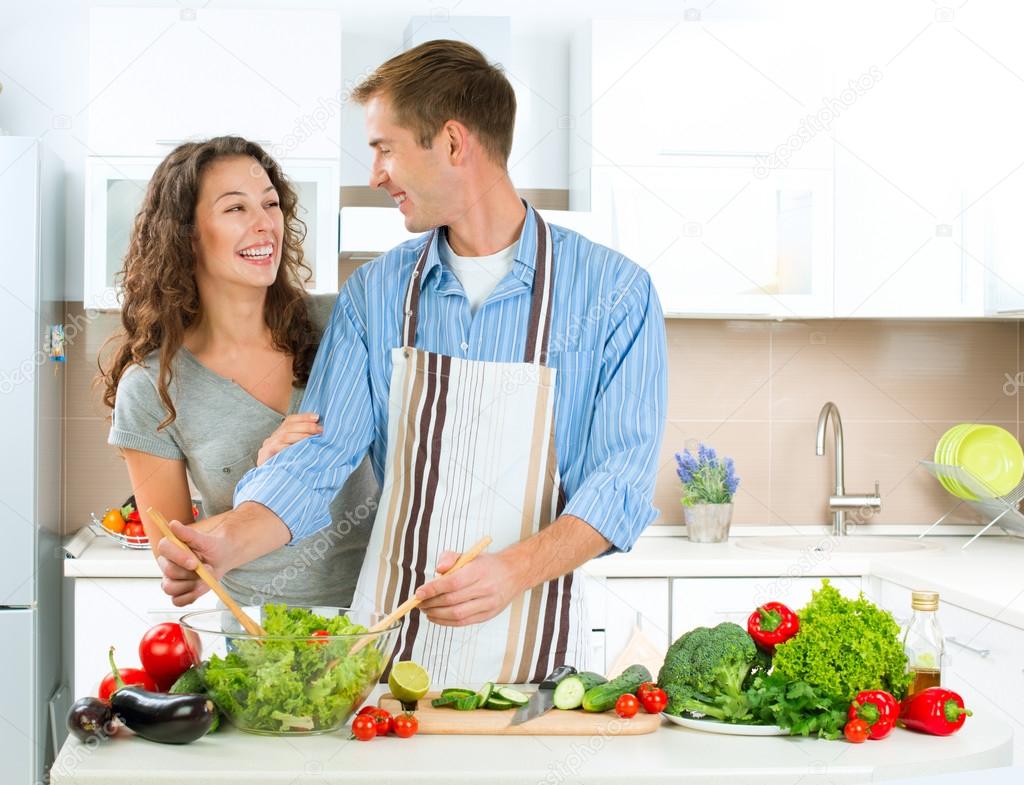 Happy Couple Cooking Together. Dieting. Healthy Food