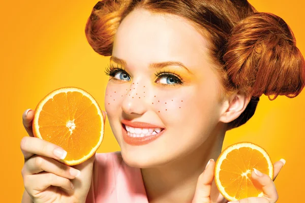 Model girl with juicy oranges. — Stock Photo, Image