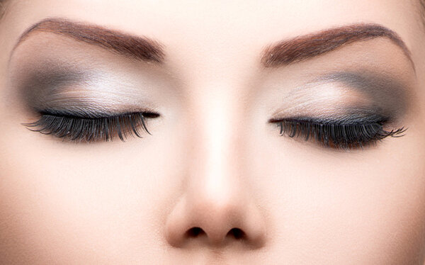 Beauty eyes makeup closeup.