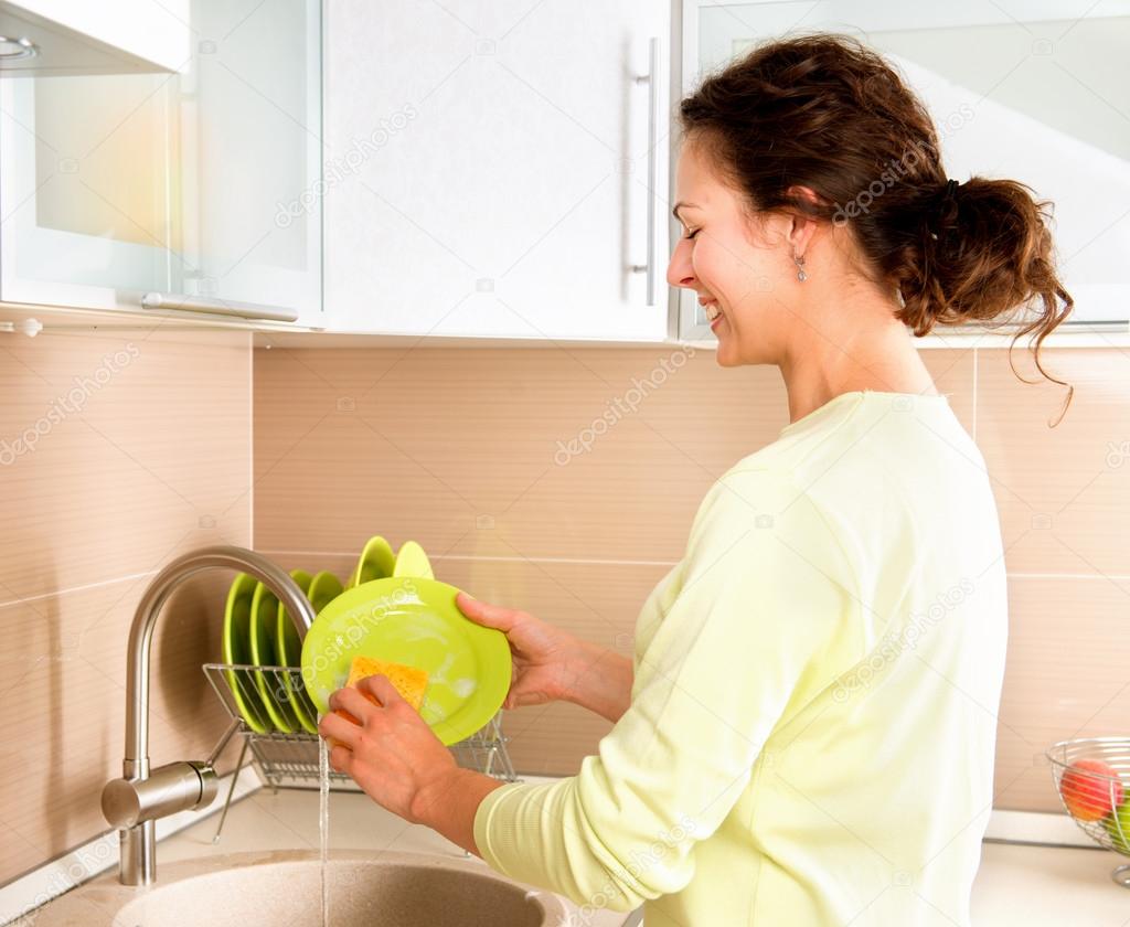 Woman Washing Dishes. Kitchen Stock Photo by ©Subbotina 48638613