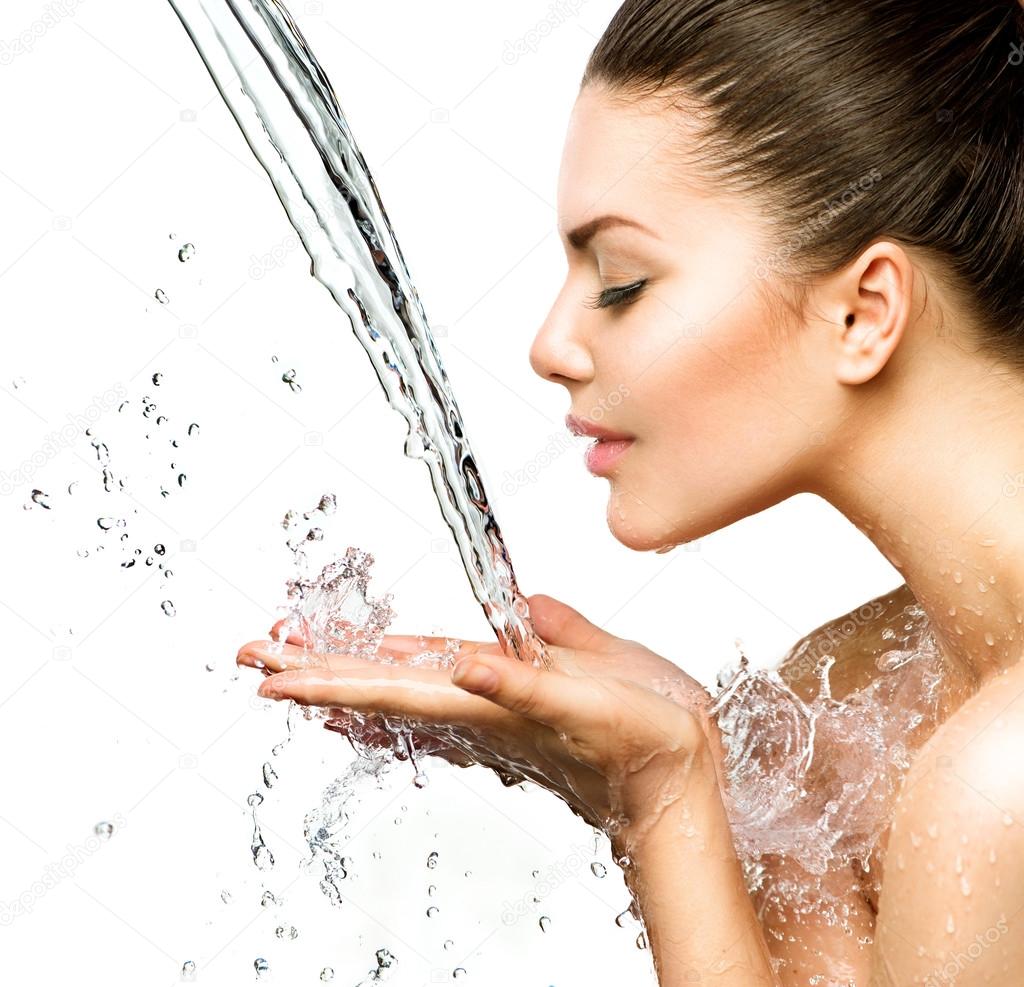 Woman with splashes of water
