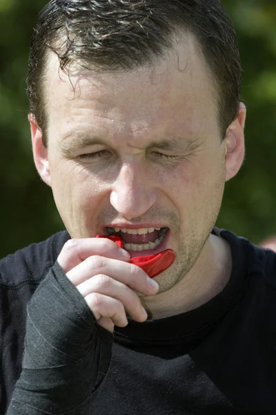 Portrait of the fighter with a boxing kappa — Stock Photo, Image