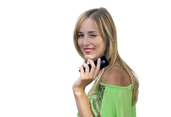 De vrouw schoonheid knipoogt met de mobiele telefoon — Stockfoto