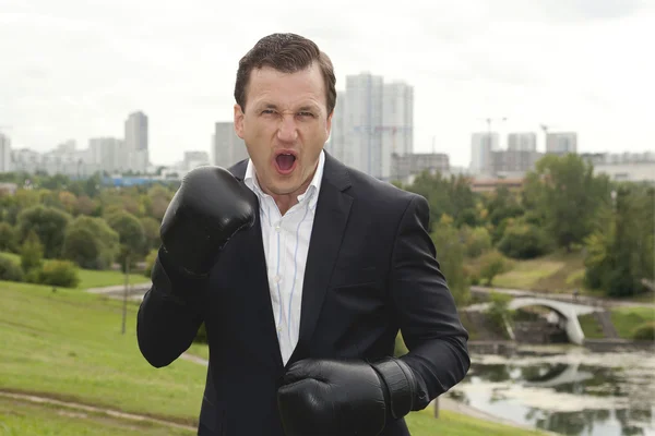 Businessman in boxing gloves. ready to business to fight. — Stock Photo, Image