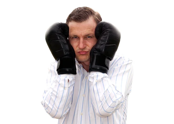 Uomo d'affari in guanti da boxe con stress e preoccupazione.Isolato su — Foto Stock