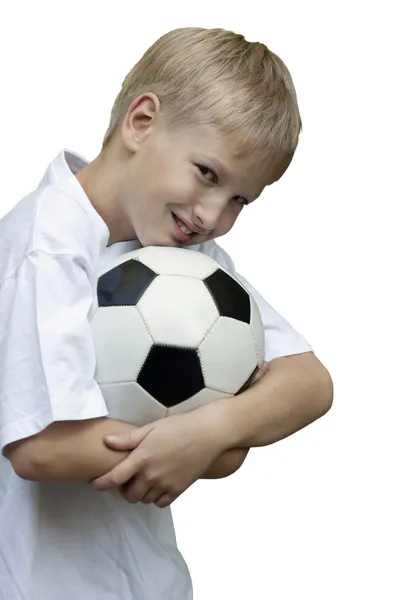 El chico con una pelota de fútbol. Aislado sobre un fondo blanco — Foto de Stock