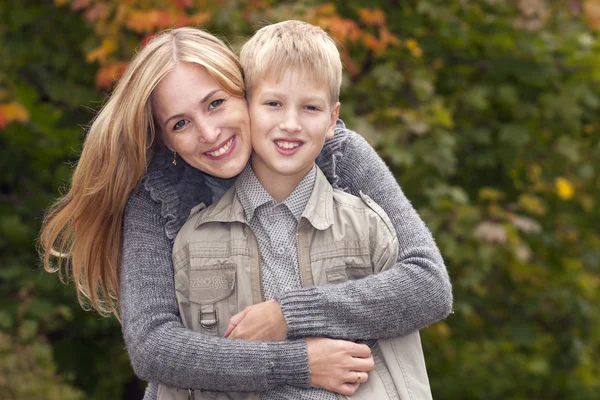 Happy mother and son in park — Stock Photo, Image