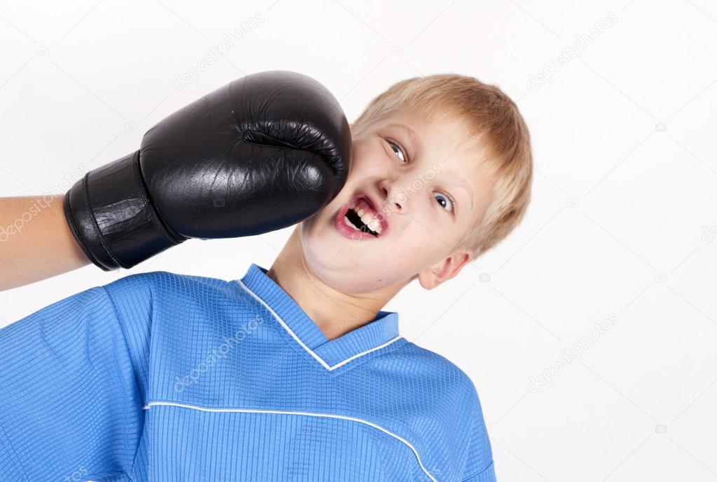 Hitting with boxing glove. Isolated on the white