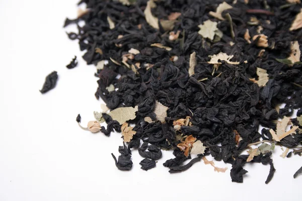 Té con pétalos de flor — Foto de Stock