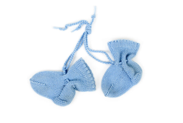 Blue newborn baby socks. isolated on white