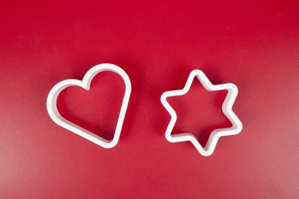 Forms for cookies on red background — Stock Photo, Image