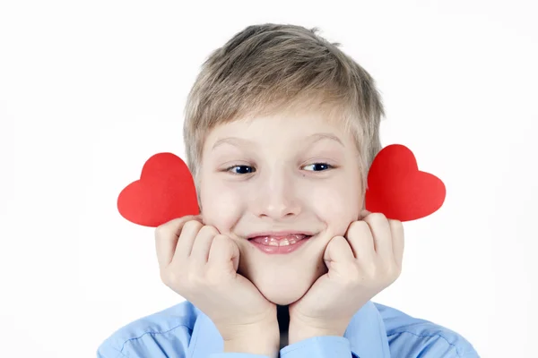 Pojke med röda hjärtan. — Stockfoto