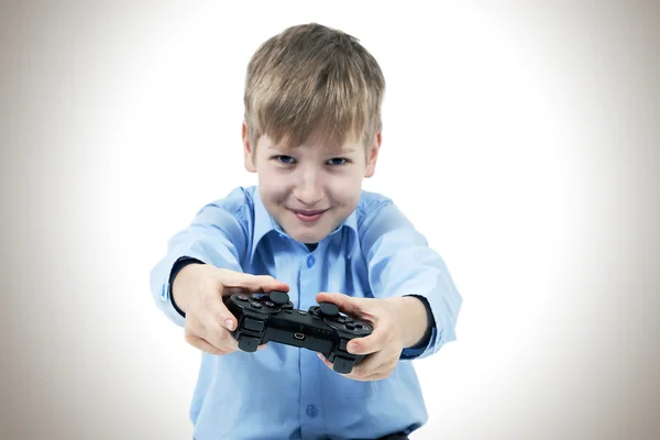 Criança com joystick para console de jogo — Fotografia de Stock