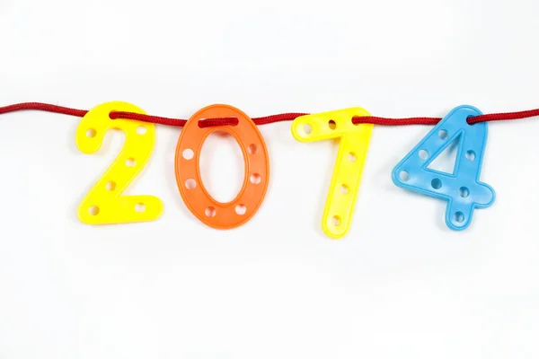 2014 van plastic cijfers op een string — Stockfoto