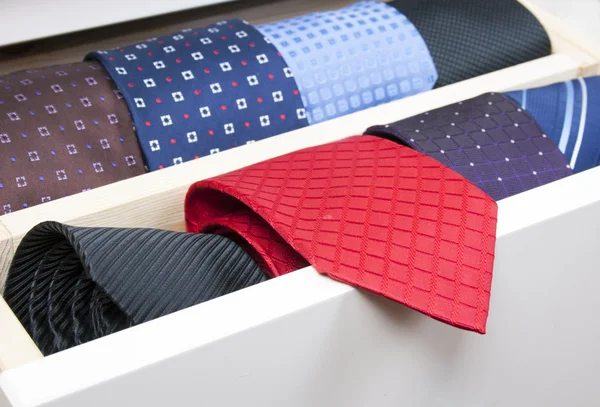 Neckties in wooden box — Stock Photo, Image