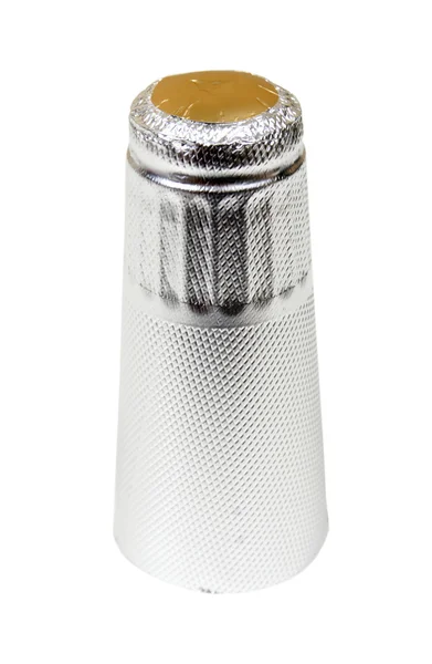 Silver capsule for a champagne bottle — Stock Photo, Image