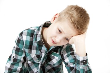 Boy propping his head on his hand clipart