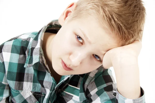 Portret van de jongen op een witte achtergrond — Stockfoto