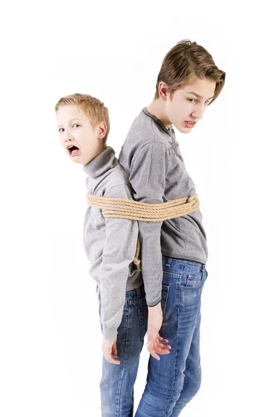 Brothers. Connected by a rope. — Stock Photo, Image