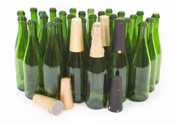 Бутылка шампанского и капсулы — стоковое фото