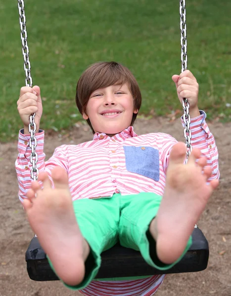 Boy one the swing — Stock Photo, Image