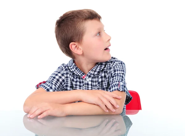 Surprised boy looking at left — Stock Photo, Image