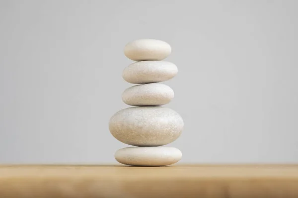 Stone Cairn White Background Five Stones Tower Simple Poise Stones — Stock Photo, Image