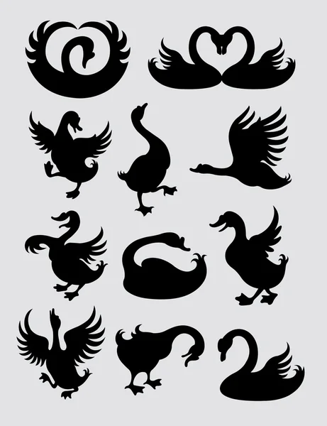 Duck and Swan Silhouette Symbols — Stock Vector