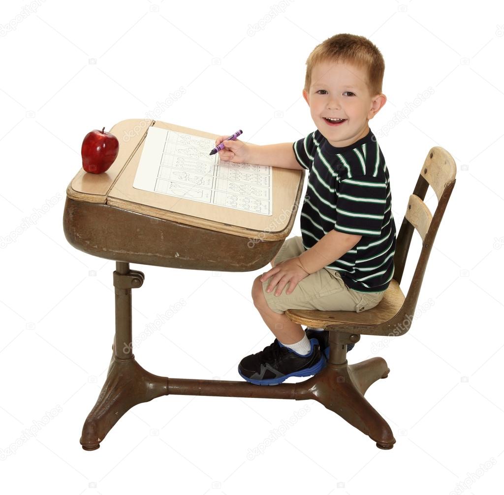 Grade School Student at his Desk