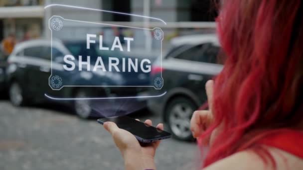 Redhead woman interacts HUD Flat Sharing — Stock Video