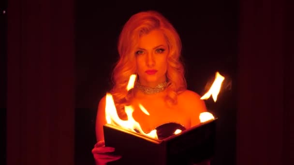 Woman burning book — Stock Video